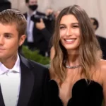 Justin Bieber and Hailey Bieber sharing a photo announcing the birth of their first child.