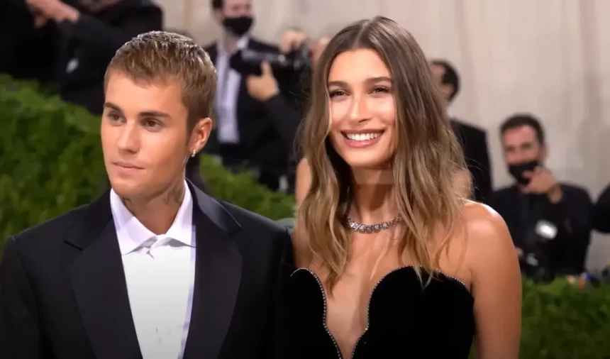 Justin Bieber and Hailey Bieber sharing a photo announcing the birth of their first child.