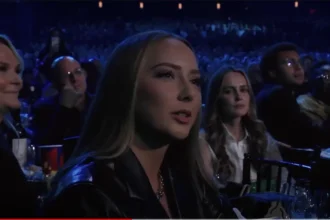 Hailie Jade reflects on the emotional impact of Eminem's songs, showcasing their deep father-daughter bond.