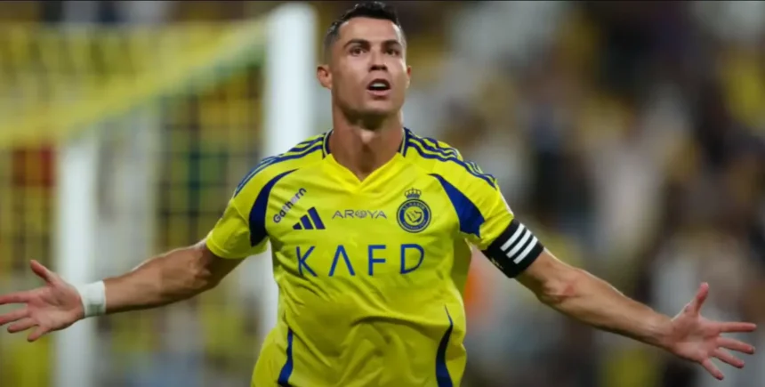 Cristiano Ronaldo celebrating after scoring a free kick for Al-Nassr.