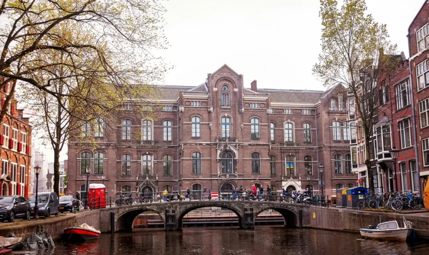 Historic building at the University of Amsterdam (UvA) with traditional architecture.