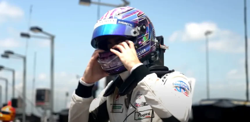 Will Power celebrating his podium finish at the Portland IndyCar race, showcasing his strategic victory.