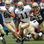 American footballers in action on the field